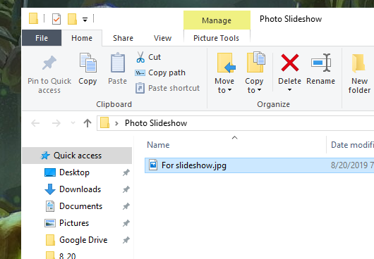 Cómo reproducir una presentación de fotos en Windows 10 2