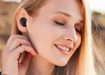 Cómo ponerse los auriculares en el oído para adaptarse 1